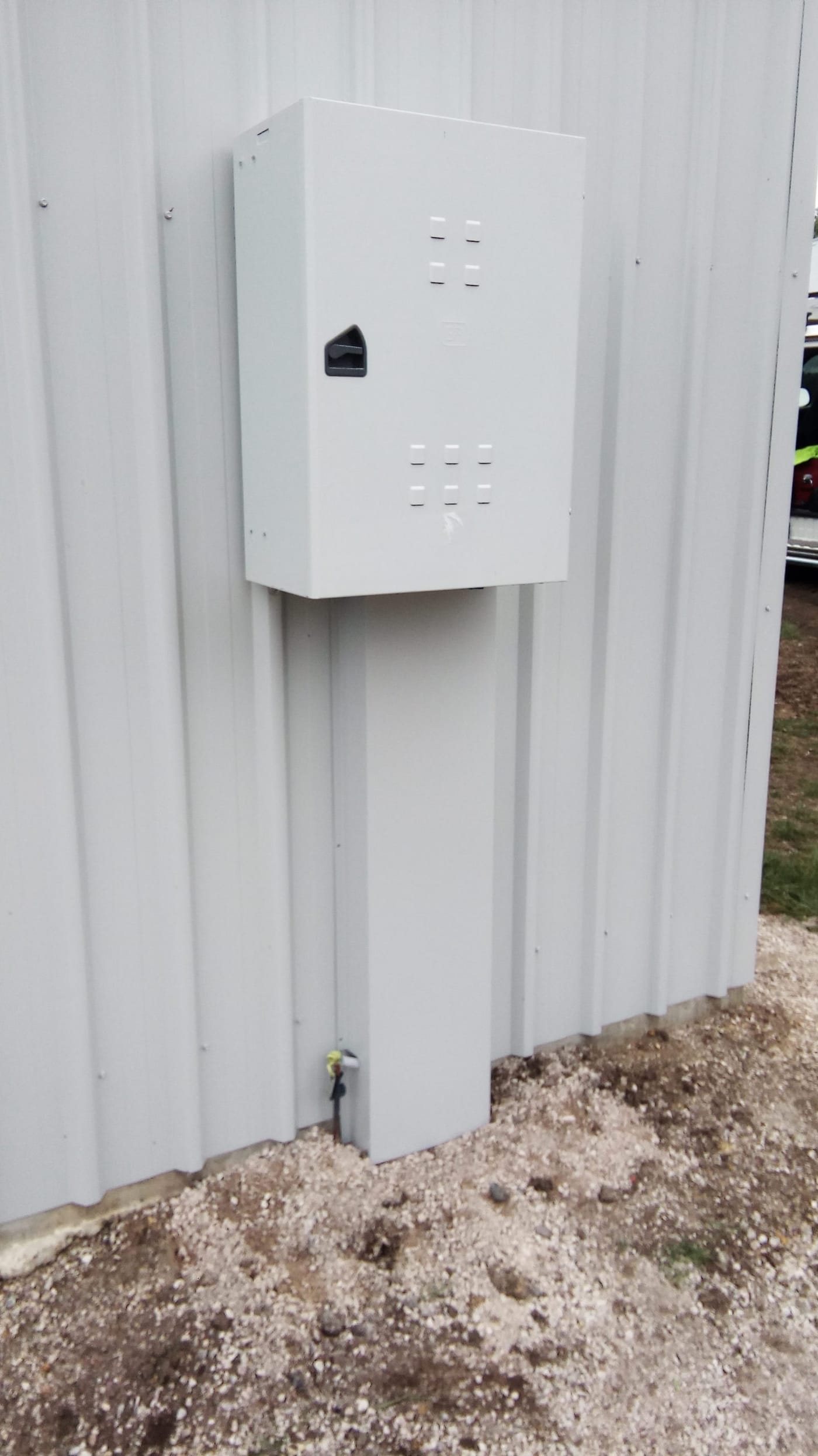 Switchboard and meter panel installation on a shed in north-west Tasmania